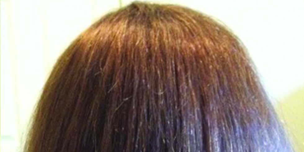 After: natural side-swept blond hair